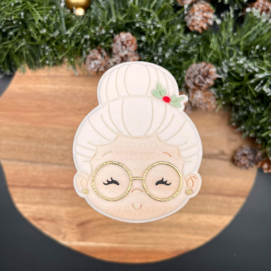 #027 - Tête Mère Noël