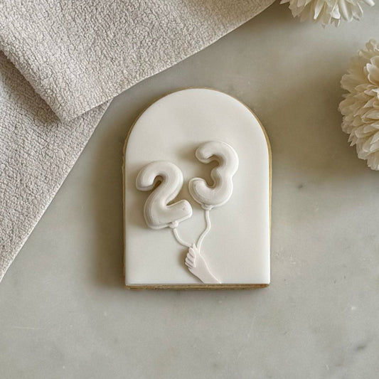 #11 - Hands holding balloons