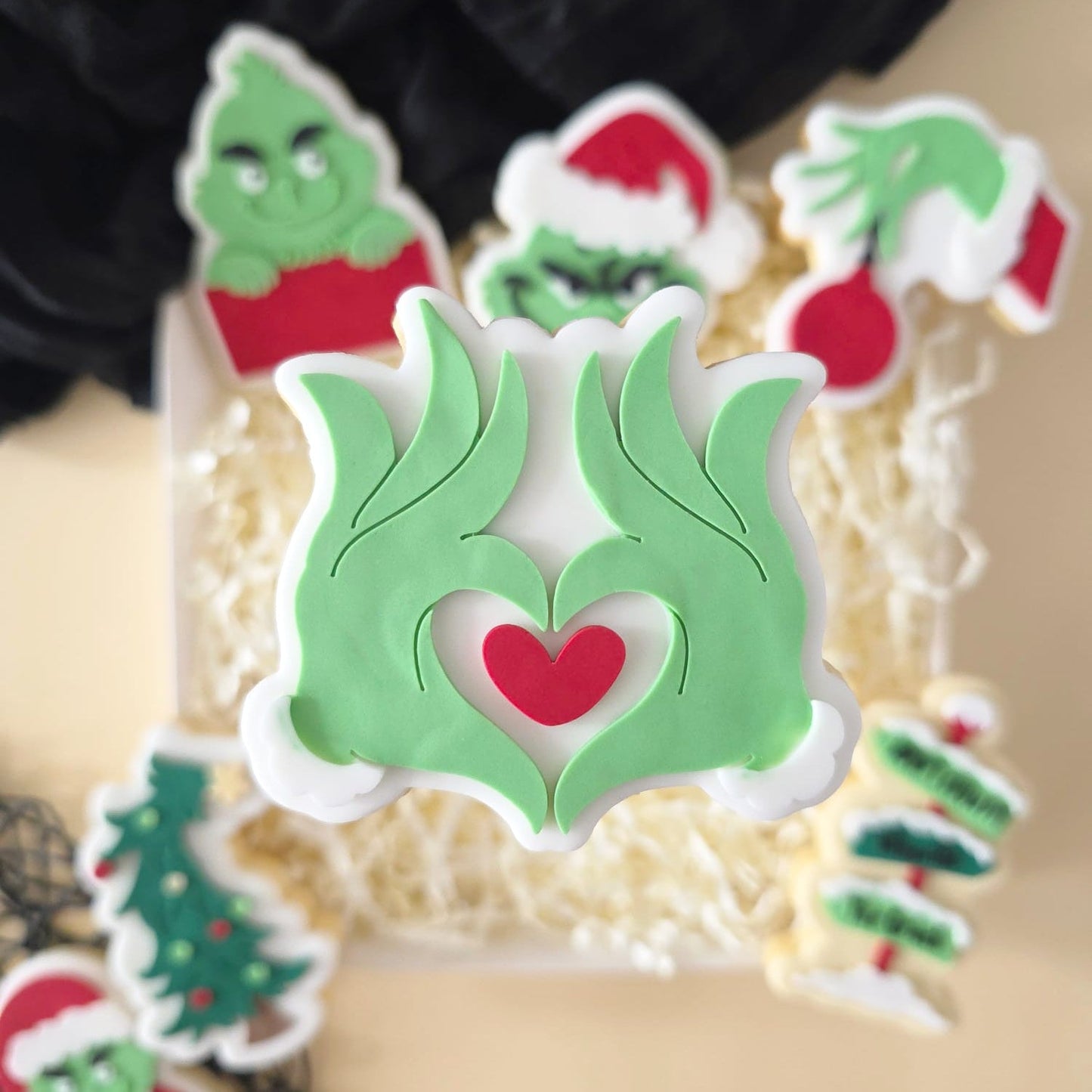 #131 - Grinch Hands Holding a Heart